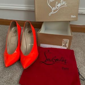 Christian Louboutin neon orange heels